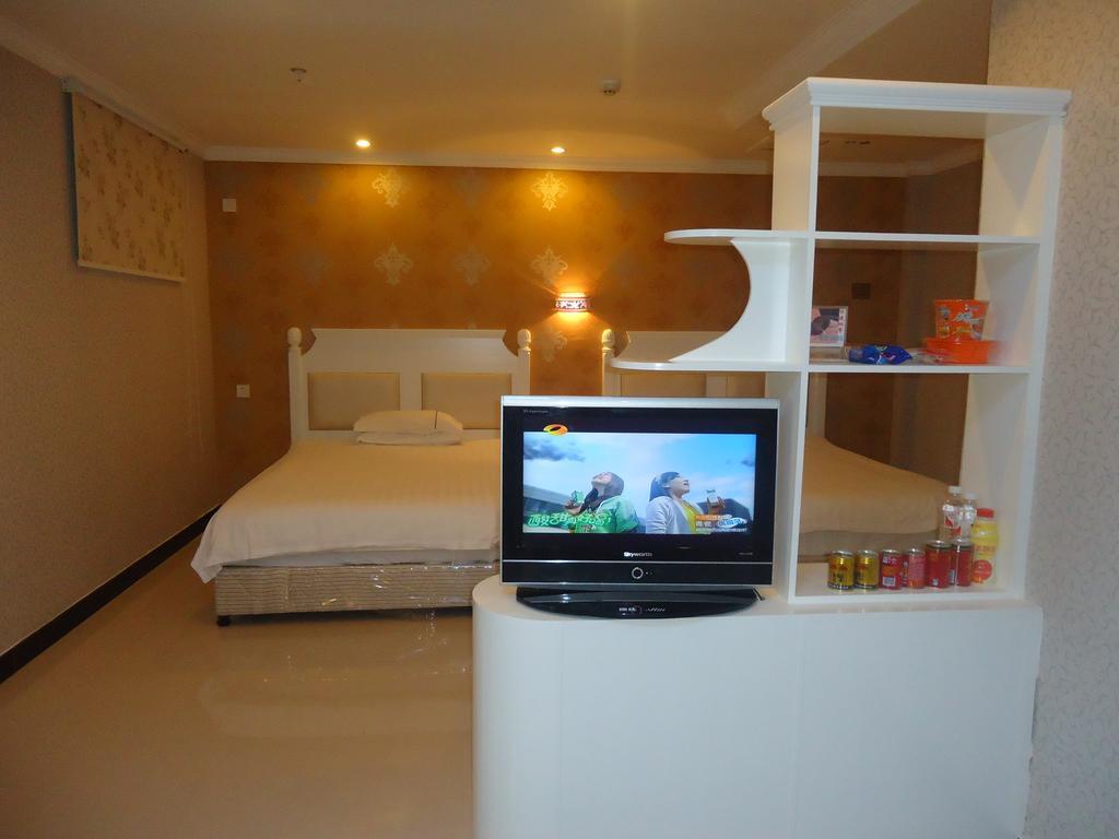 Omeiga Business Hotel Yiwu (Zhejiang) Zimmer foto