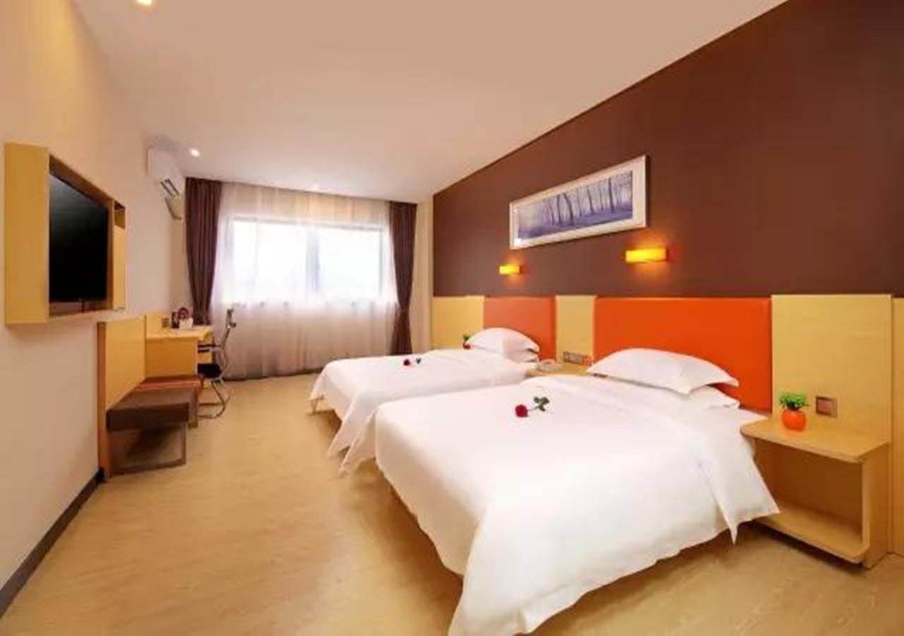 Omeiga Business Hotel Yiwu (Zhejiang) Exterior foto
